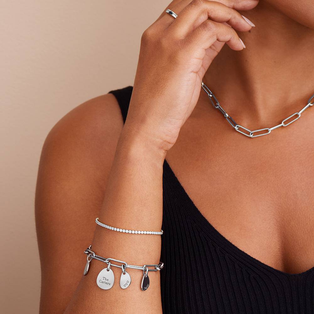 SCHAKELARMBAND BEDELTJES