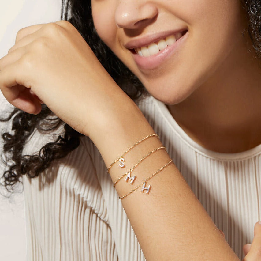 INITIALE ARM/ENKEL BANDJE